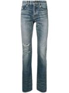 Saint Laurent Ripped Stonewashed High Rise Jeans - Blue