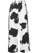 Mademe Flared Cow Print Trousers - White