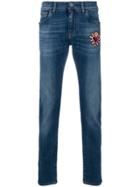 Dolce & Gabbana Sacred Heart Patch Jeans - Blue