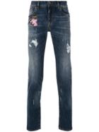 Dolce & Gabbana Distressed Slim Fit Jeans With Patches - Blue