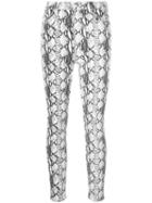 Frame Snakeskin Skinny Jeans - White