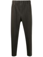 Homme Plissé Issey Miyake Pleated Tapered Trousers - Green