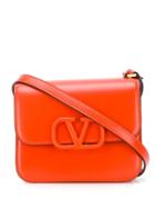 Valentino Valentino Garavani Logo Plaque Crossbody Bag - Orange
