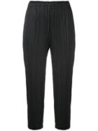 Pleats Please By Issey Miyake Cropped Jogging Trousers - Black