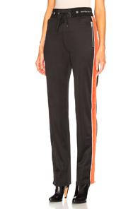 Givenchy Technical Neoprene Jersey Joggers In Black,orange