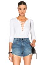 Pam & Gela Long Sleeve Lace Up Top In White
