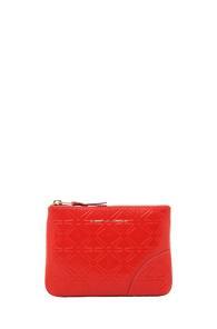 Comme Des Garcons Star Embossed Small Pouch In Orange,geometric Print