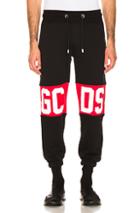 Gcds Logo Band Sweatpants In Black,red