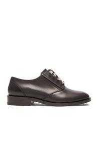 Balenciaga Studded Leather Derbies In Black