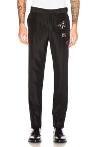 Alexander Mcqueen Embroidered Trousers In Black