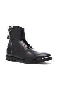 Alexander Mcqueen Strap Leather Combat Boots In Black