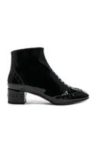 Chloe Perry Patent Leather Ankle Boots In Black