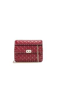 Valentino Medium Quilted Rockstud Spike Shoulder Bag In Red