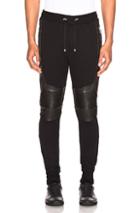 Balmain Ribbed Moto Sweatpants With Leather Details In Black