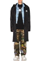 Vetements Long Raincoat In Black