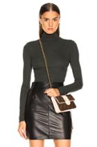 Enza Costa Rib Fitted Long Sleeve Turtleneck In Green