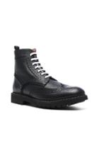 Givenchy Leather Wingtip Boots In Black