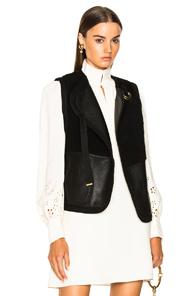 Chloe Reversible Shearling Vest In Black