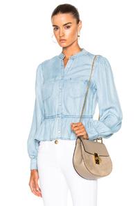 Frame Denim Double Pocket Peplum Blouse In Blue