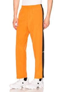 Heron Preston Style Side Stripe Loose Pants In Orange