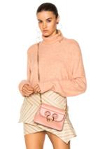 Frame Denim Slouchy Turtleneck Sweater In Neutrals,pink