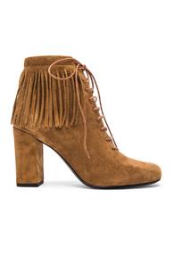 Saint Laurent Fringe Suede Booties In Brown