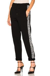 Alexander Mcqueen Leopard Printed Lounge Pants In Animal Print,black