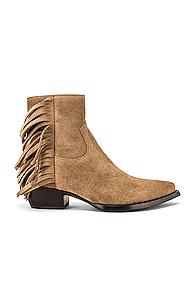 Saint Laurent Lukas Fringe Boots In Neutral