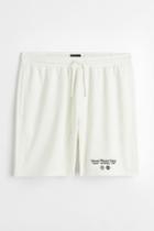 H & M - Relaxed Fit Mesh Shorts - White