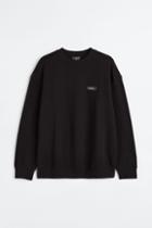 H & M - Relaxed Fit Appliqud Sweatshirt - Black