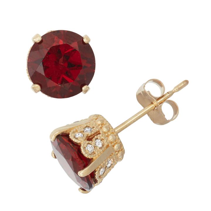 Genuine Garnet And 1/6c. T.t.w. Diamond 10k Yellow Gold Earrings