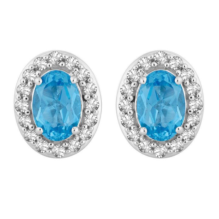 1/6 Ct. T.w. Genuine Blue Topaz 10k White Gold 9.1mm Oval Stud Earrings