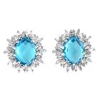 1/2 Ct. T.w. Oval Blue Topaz 18k Gold Stud Earrings