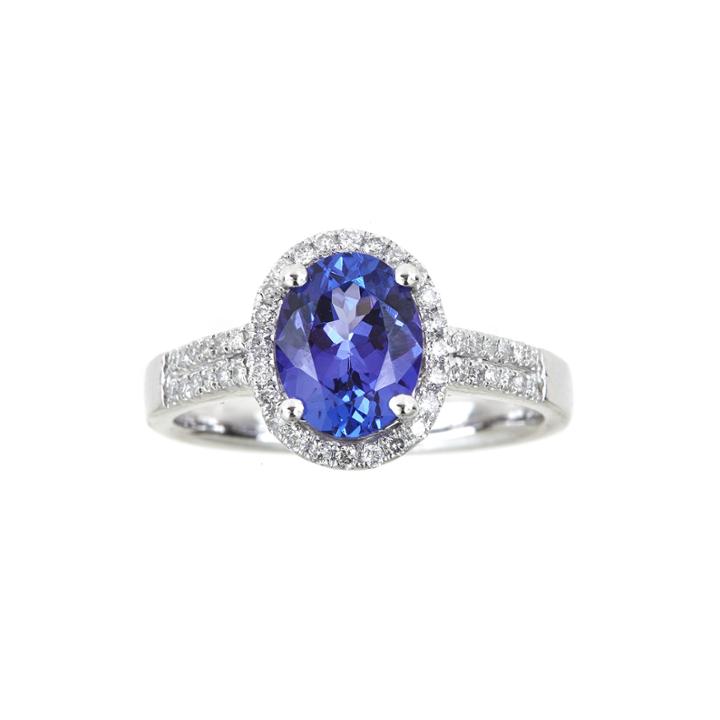 Limited Quantities Oval Genuine Tanzanite And 1/4 Ct. T.w. Diamond Ring
