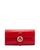 Mabelle Sleek Leather Medallion Clutch Bag
