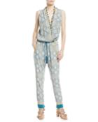 Sleeveless Twisted Racerback Printed Jumpsuit With Pompom Trim