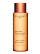 Clarins Liquid Bronze Self-tanning For Face And Decollete/ 4.2 Oz.