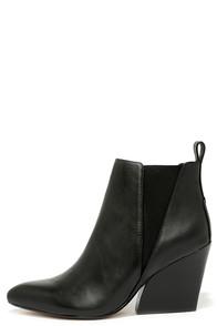 Report Signature Myrna Black Leather Wedge Booties