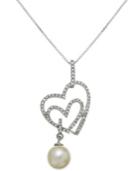 Sterling Silver Necklace, Cultured Freshwater Pearl (7mm) And Diamond (1/4 Ct. T.w.) Heart Pendant