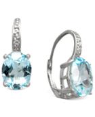 Sterling Silver Earrings, Blue Topaz (7 Ct. T.w.) And Diamond Accent Oval Earrings