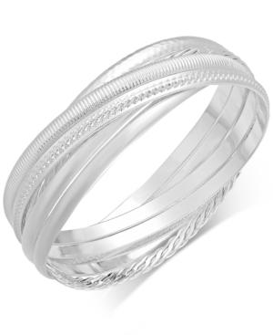 Touch Of Silver Textured Interlocking Bangle Bracelet In Silver-plated Metal