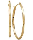 Thin Twist Oval Hoop Earrings In 10k Gold, 1 Inch