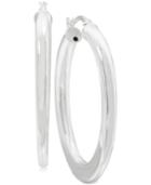 Polished Tube Oval Hoop Earrings In Sterling Silver