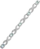 Sterling Silver-plated Bracelet, Blue Topaz (3-3/4 Ct. T.w.) And Diamond Accent Xo Bracelet