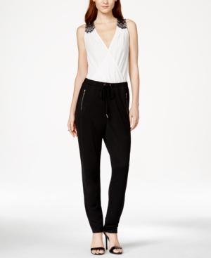 Marilyn Monroe Juniors' Lace-trim Surplice Jumpsuit