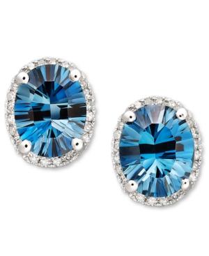 14k White Gold Earrings, London Blue Topaz (4-1/2 Ct. T.w.) And Diamond (1/8 Ct. T.w.) Oval Stud Earrings