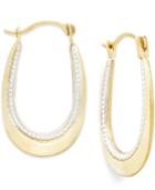 Two-tone Oval Hoop Earrings In 10k Gold And Polished Rhodium