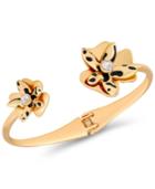 Guess Gold-tone Exotic Flower Hinged Cuff Bracelet