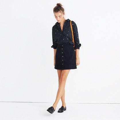 Madewell Metropolis Snap Jean Skirt In Rawley Black