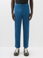 Homme Pliss Issey Miyake - Technical-pleated Tapered-leg Trousers - Mens - Blue